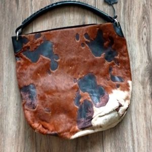 Charlie Lapson shoulder handbag made from leather and cowhide